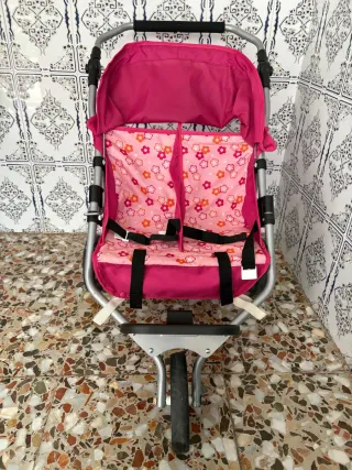 Cochecito de muñecas rosa