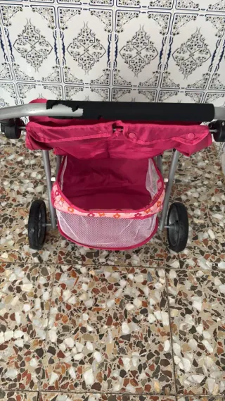 Cochecito de muñecas rosa