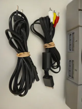 Playstation 1 + juego skate.