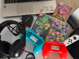 Nintendo Switch Bianca + 3 Giochi + Accessori