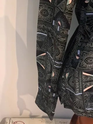 Blusa manga larga estampada