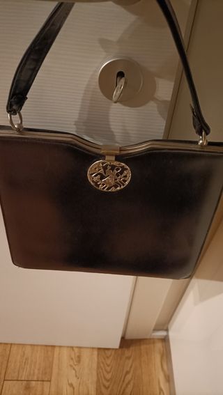 Borsetta a mano vintage con fermaglio lavorato