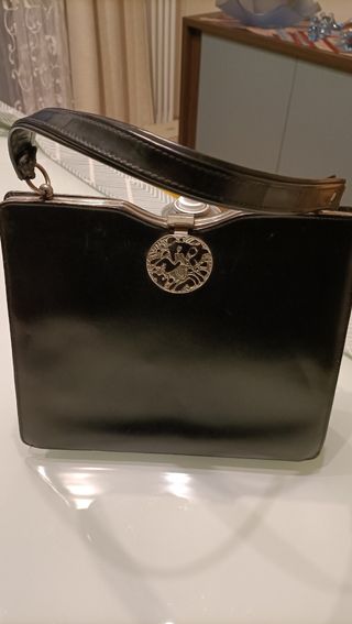 Borsetta a mano vintage con fermaglio lavorato