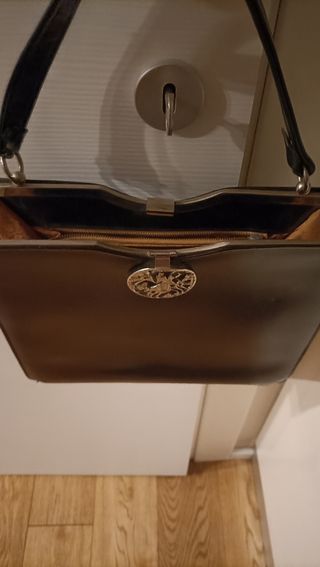 Borsetta a mano vintage con fermaglio lavorato