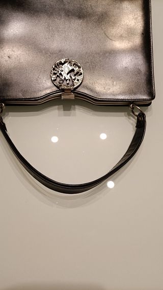 Borsetta a mano vintage con fermaglio lavorato