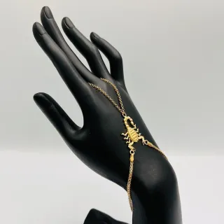 BRACCIALE MANO SCORPIONE. Oro 18k. Peso: 5,93gr, M