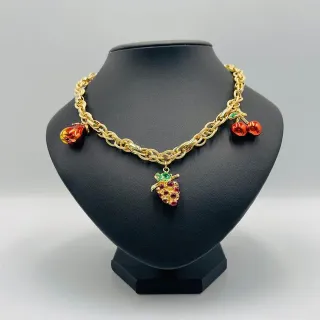 Collana con perle a forma di uva e ciliegia in oro 18K.