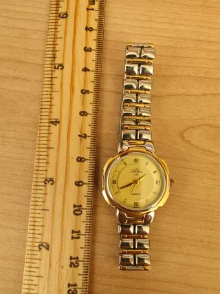 Reloj Altex One Japan Movt. Dorado y Plateado