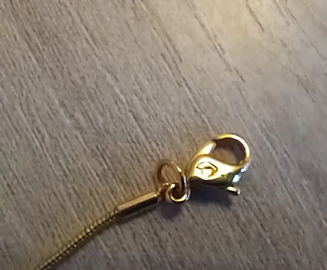 Collana color oro con ciondoli goccia