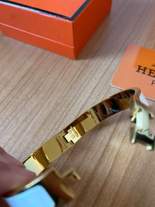 Pulsera Hermès Blanca y Dorada