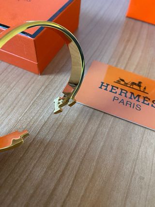 Pulsera Hermès Blanca y Dorada