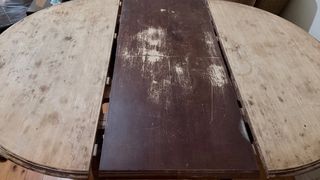 Mesa redonda de madera extensible