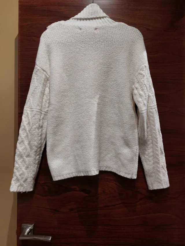 Jersey de punto blanco cuello alto