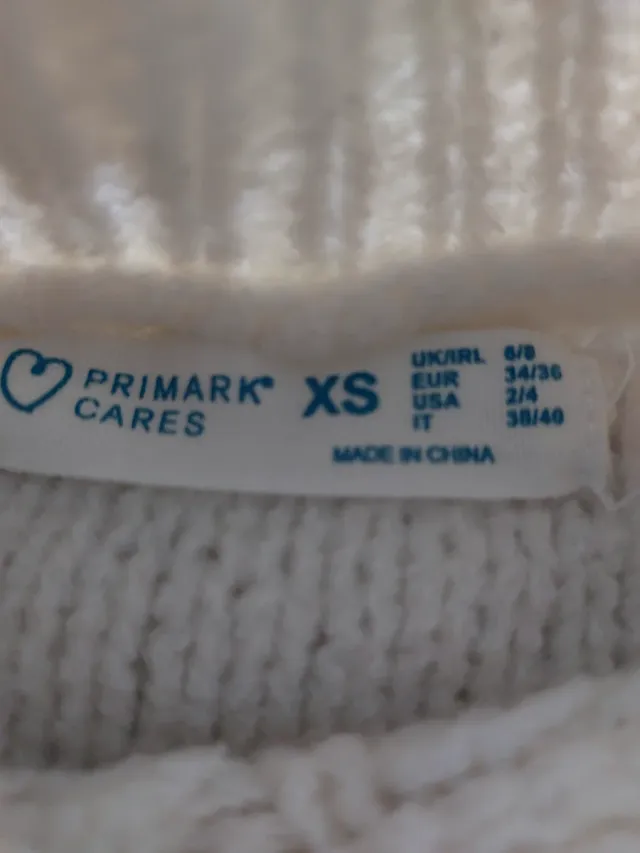 Jersey de punto blanco cuello alto