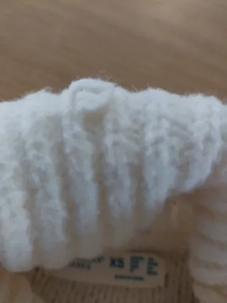 Jersey de punto blanco cuello alto