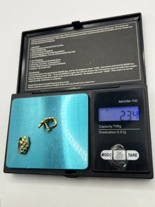 Orecchini in oro 18k con zirconi da 2,34 gr.