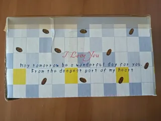 Tazzina con piattino e cucchiaino. Nuova