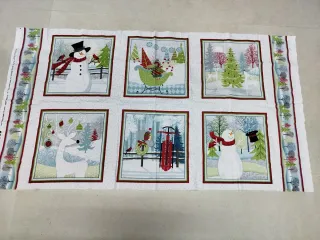 Panel de tela navideño con muñecos de nieve