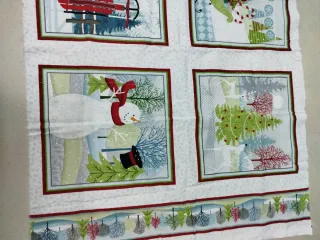 Panel de tela navideño con muñecos de nieve