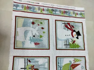 Panel de tela navideño con muñecos de nieve