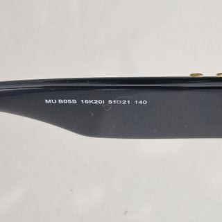 Gafas de sol Miu Miu mujer negras y doradas