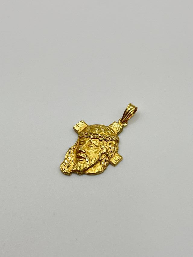 Croce d'oro 18k. Peso: 2,54 gr.