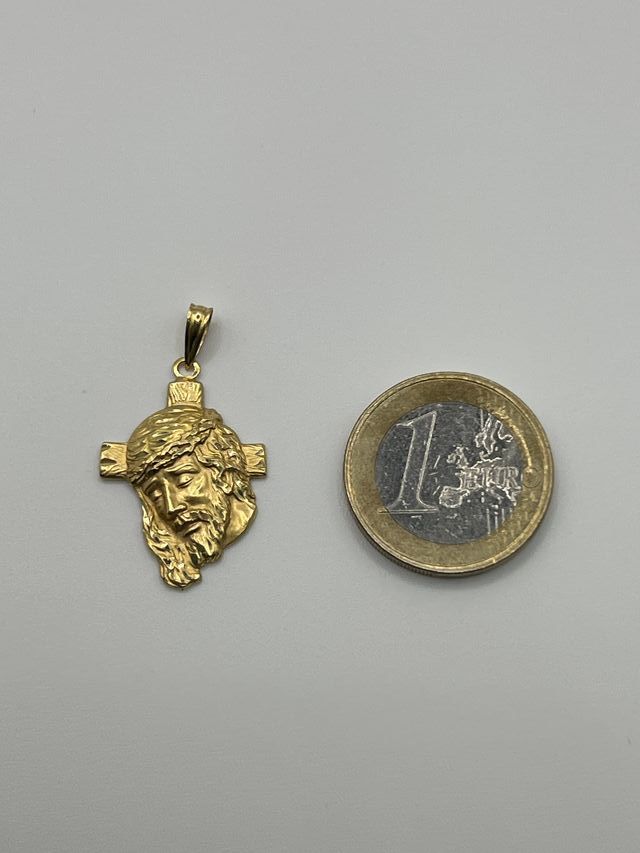 Croce d'oro 18k. Peso: 2,54 gr.
