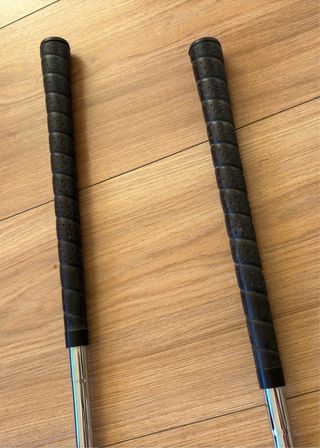 Palos de golf dorados