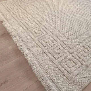 Alfombra de lana en color crudo