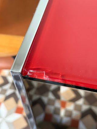 Mesa comedor cristal rojo patas cromo