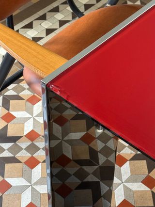 Mesa comedor cristal rojo patas cromo