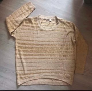 Jersey dorado con rayas brillantes