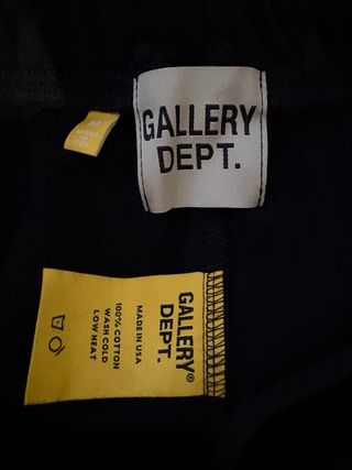 Pantaloni Gallery Dept. neri con macchie