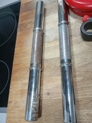 Pesas y barras para gimnasio