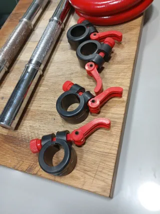 Pesas y barras para gimnasio