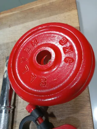 Pesas y barras para gimnasio