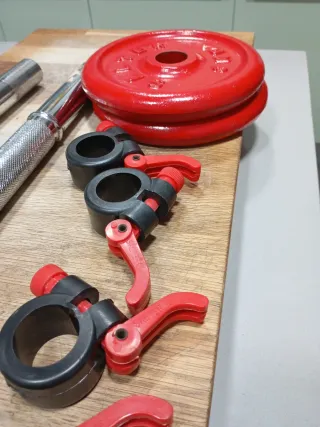 Pesas y barras para gimnasio