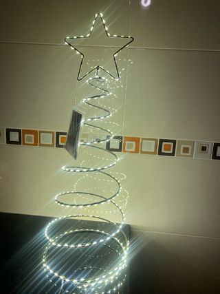 Decoración estrella espiral plata