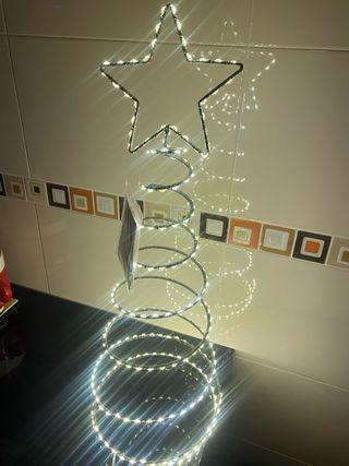 Decoración estrella espiral plata