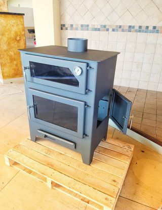 Estufa NUEVA de leña gris con horno
