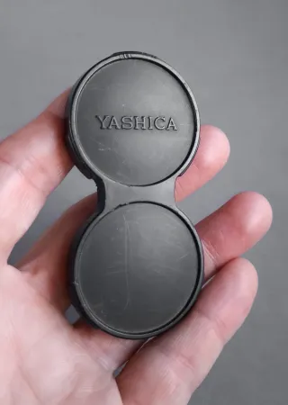 Copriobiettivo per fotocamere TLR Yashica