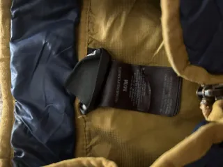 Chaqueta The North Face Azul y Dorado