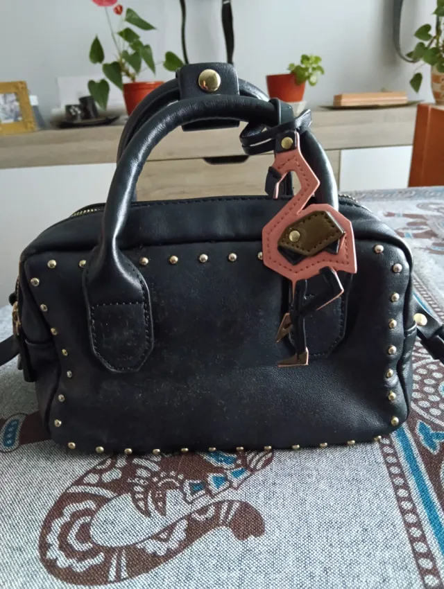 Bolso negro pequeño doble cremallera flamenco