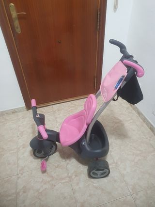 Triciclo infantil rosa y gris