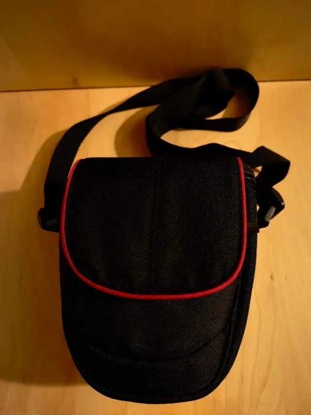 Bandolera negra para cámara