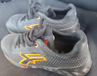 Botas de seguridad U-Power negras y naranjas