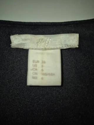 Mono H&M lentejuelas negro talla S