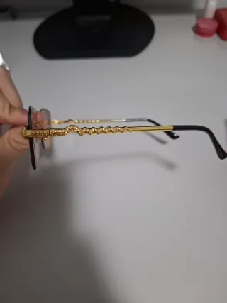 Gafas de sol Cartier doradas