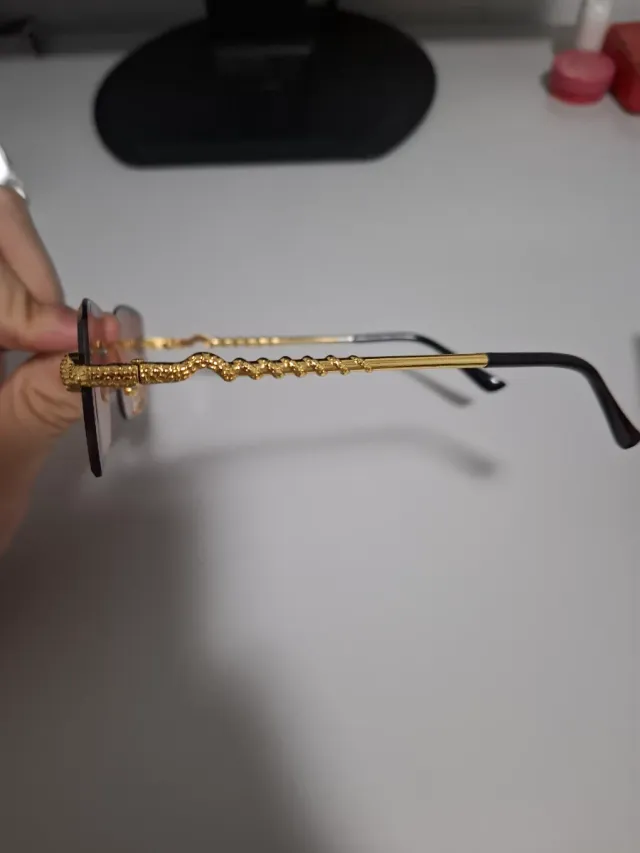 Gafas de sol Cartier doradas