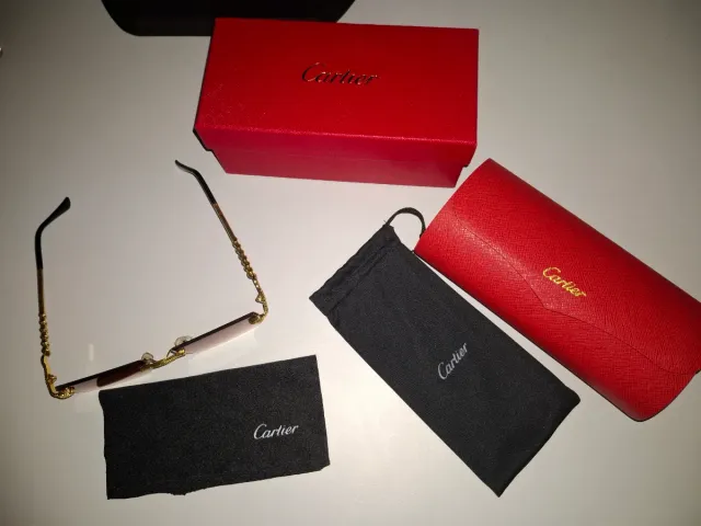 Gafas de sol Cartier doradas